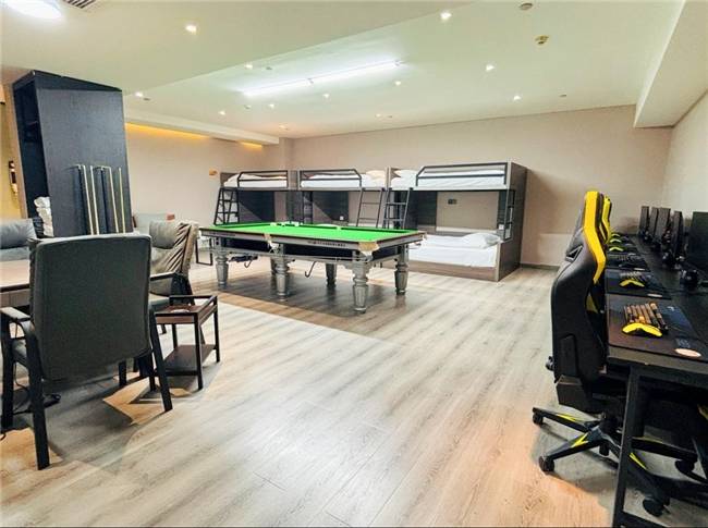 竞以多元主题房型撬动年轻消费市场开元棋牌电竞酒店风口正盛：爱电(图5)